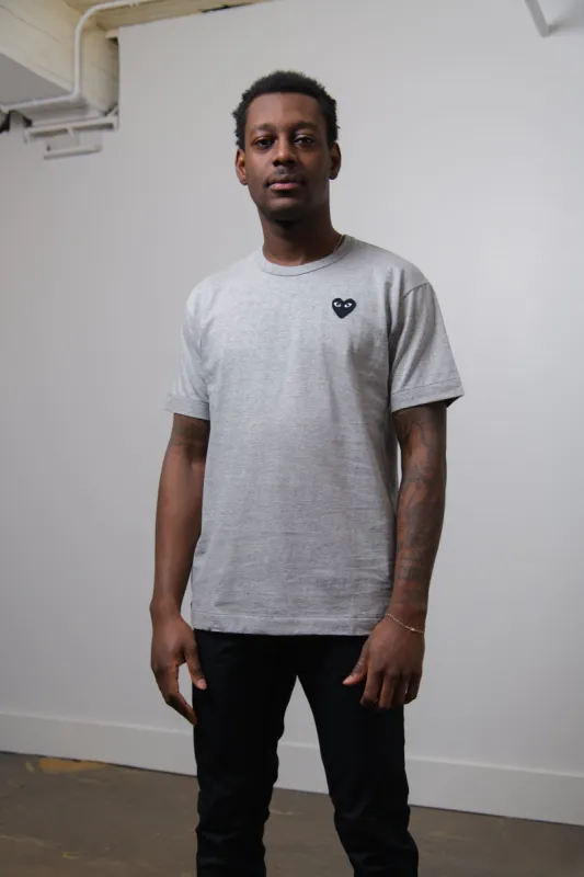 Emblem Tee Grey/Black T076 sold by Nomad