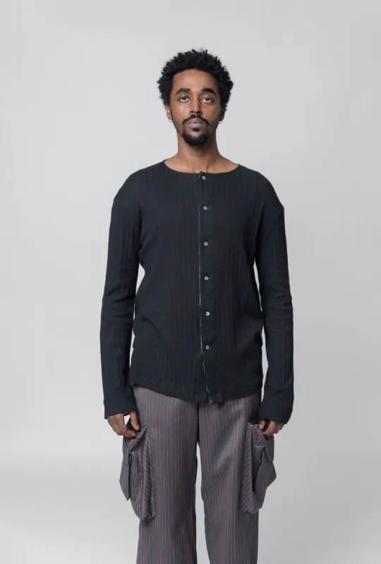 Dolly Henley Tee Black sold by Nomad