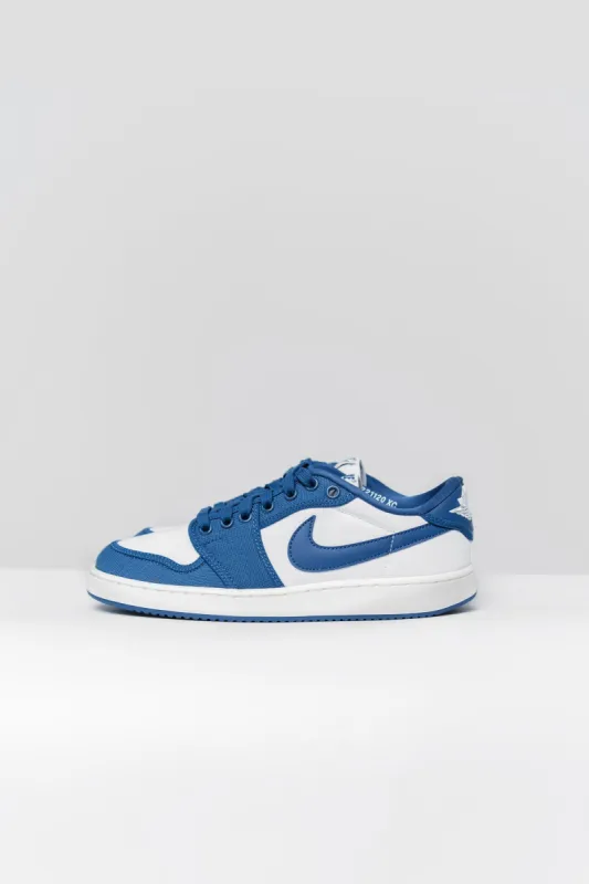 AJKO 1 Low White/Dark Royal Blue DX4981-103 (LAUNCH PRODUCT) sold by Nomad