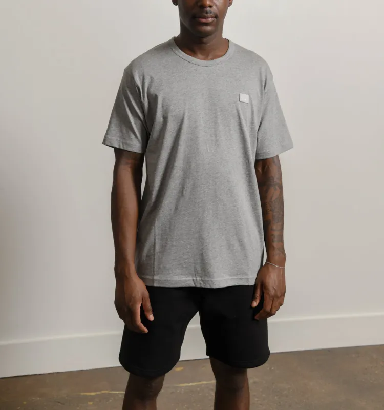 Face Logo Tee Light Grey Melange 25E173 sold by Nomad