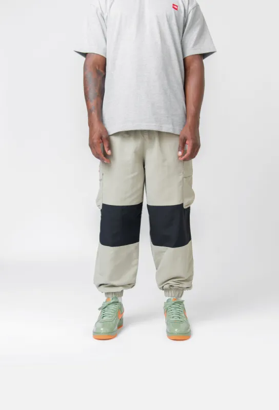 M Himalayan Track Pant Clay Grey/TNF Black NF0A88XX5IF sold by Nomad