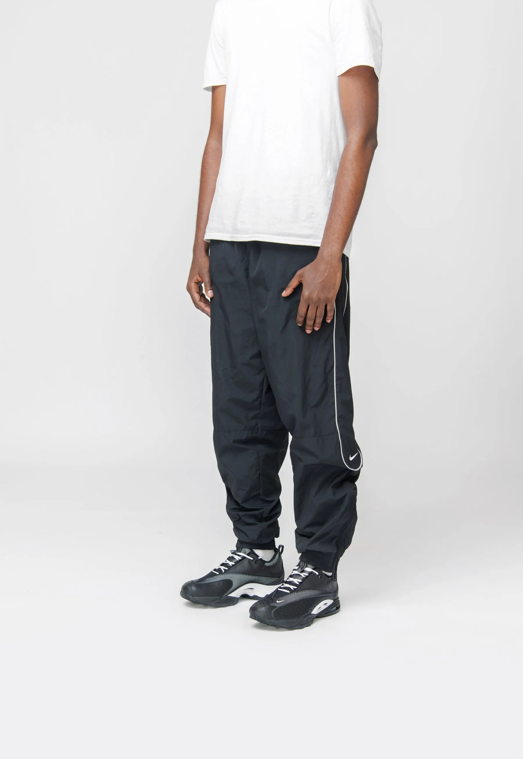 Nike Solo Swoosh Pants Black/White FB8620-010 sold by Nomad product image thumbnail 4