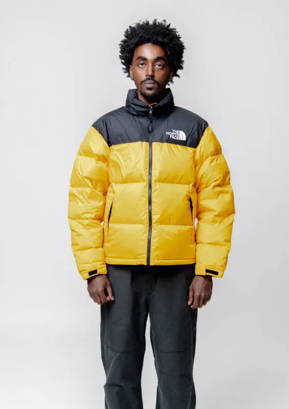 M 96 Retro Nuptse Jacket Summit Gold/TNF Black NF0A3C8DZU3 sold by Nomad