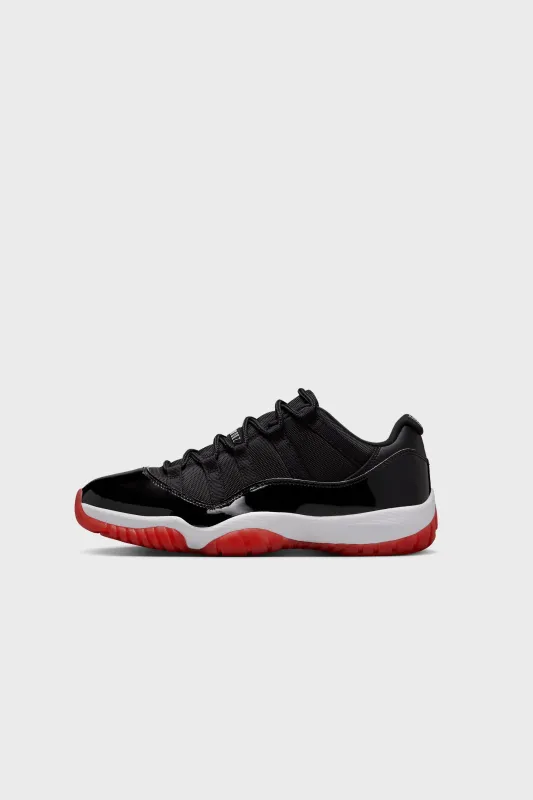 Air Jordan 11 Low Black/Varsity Red-White FV5104-006 sold by Nomad
