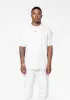 NOCTA CS Tee LT Orewood Brown IB5673-104 sold by Nomad