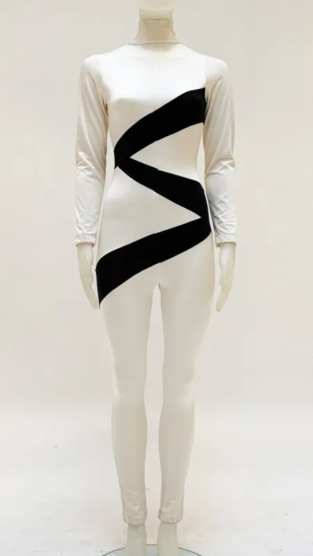 SPLICED LONG SLEEVE TURTLENECK JUMPSUIT sold by Norma Kamali