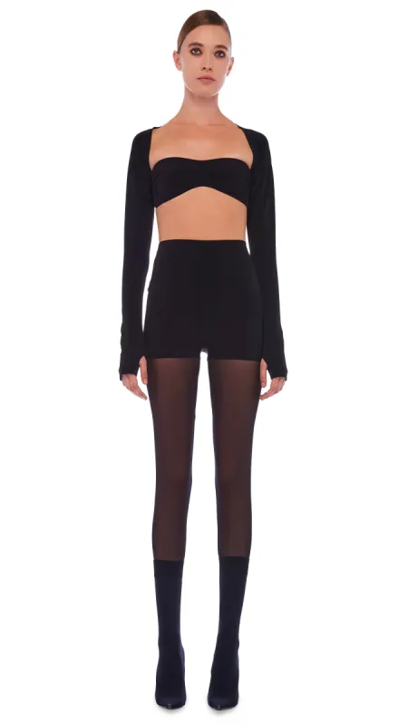 LEGGING W/ MESH BOTTOM FOOTIE sold by Norma Kamali