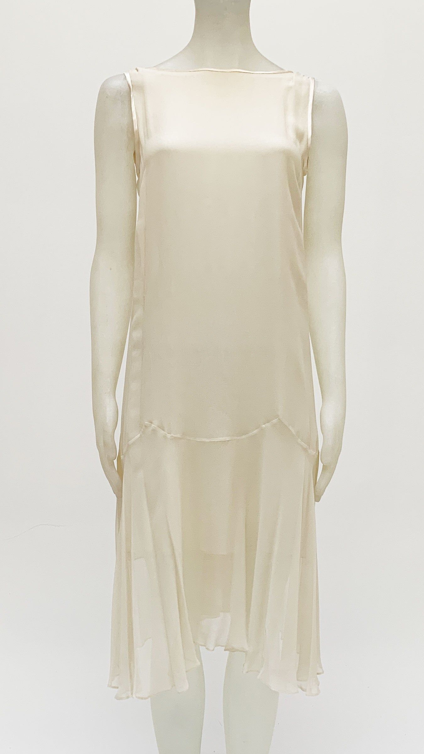 SLEEVELESS TIE FRONT BABYDOLL DRESS sold by Norma Kamali