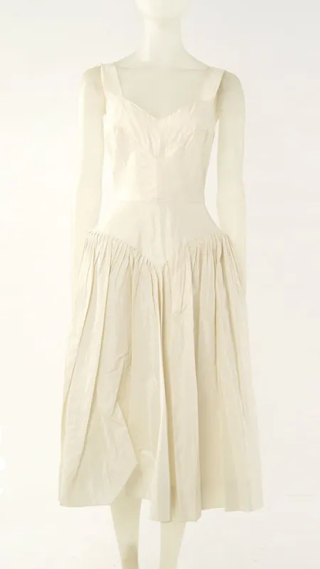 BOW BACK FLARED DRESS sold by Norma Kamali
