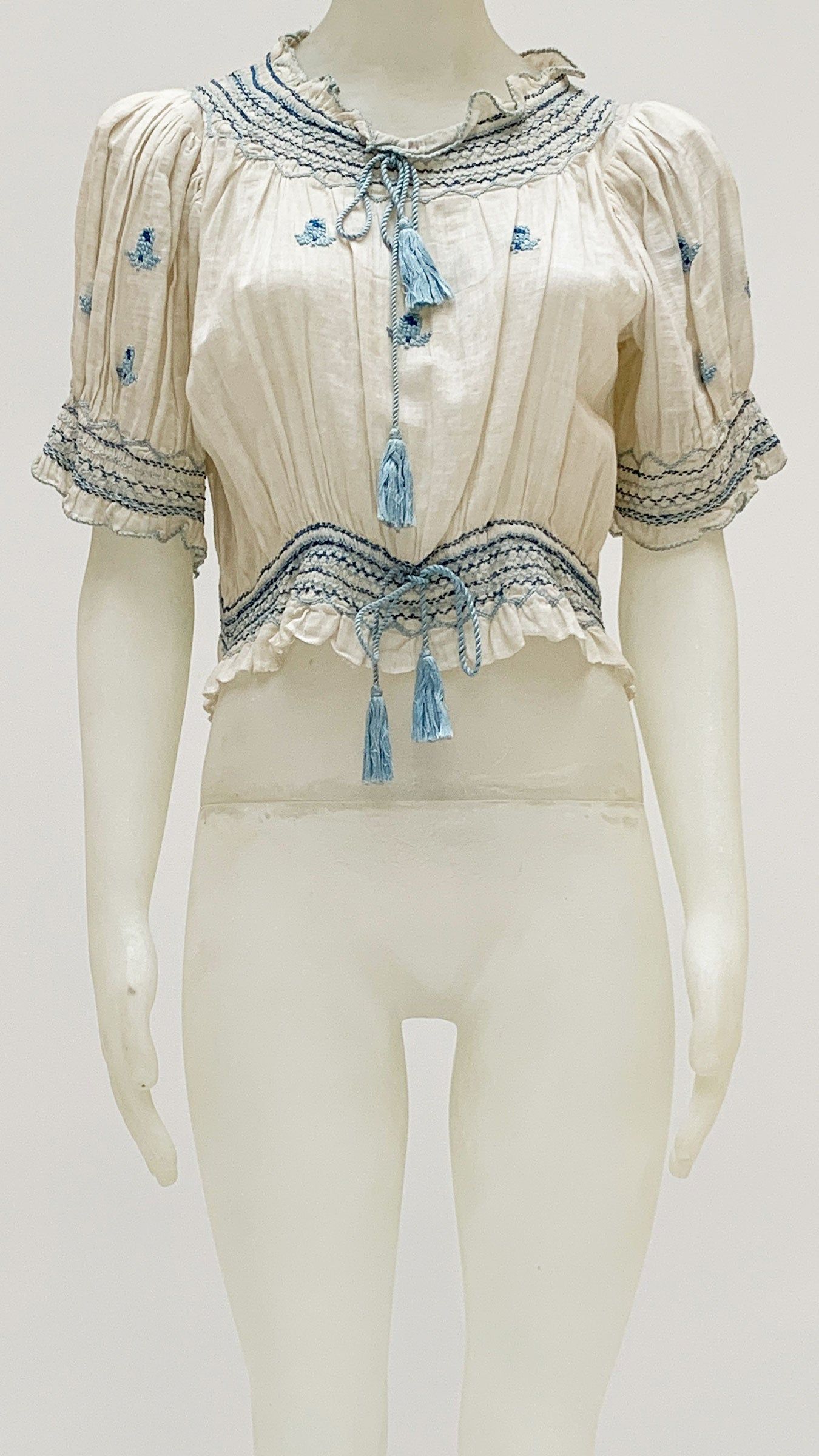 SHORT SLEEVE PEASANT TOP WITH EMBROIDERY sold by Norma Kamali