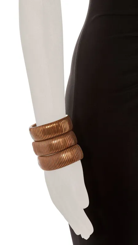 BRASS RIBBED BANGLE SET OF 3 sold by Norma Kamali