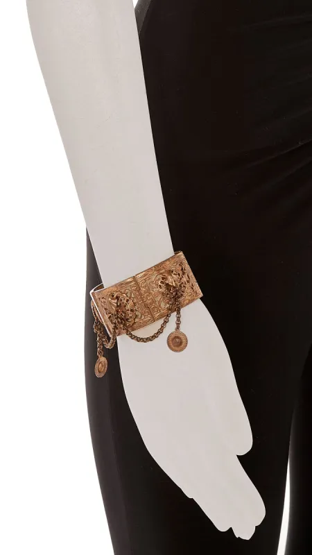 BRASS CUFF WITH CHAIN DROP CHARMS sold by Norma Kamali
