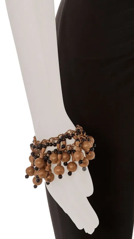 TRI LAYER BRASS TONED METAL LINK CHAIN AND BEADED BRACELET sold by Norma Kamali