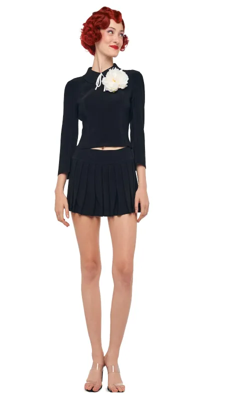 PLEATED PICKLEBALL SKIRT sold by Norma Kamali