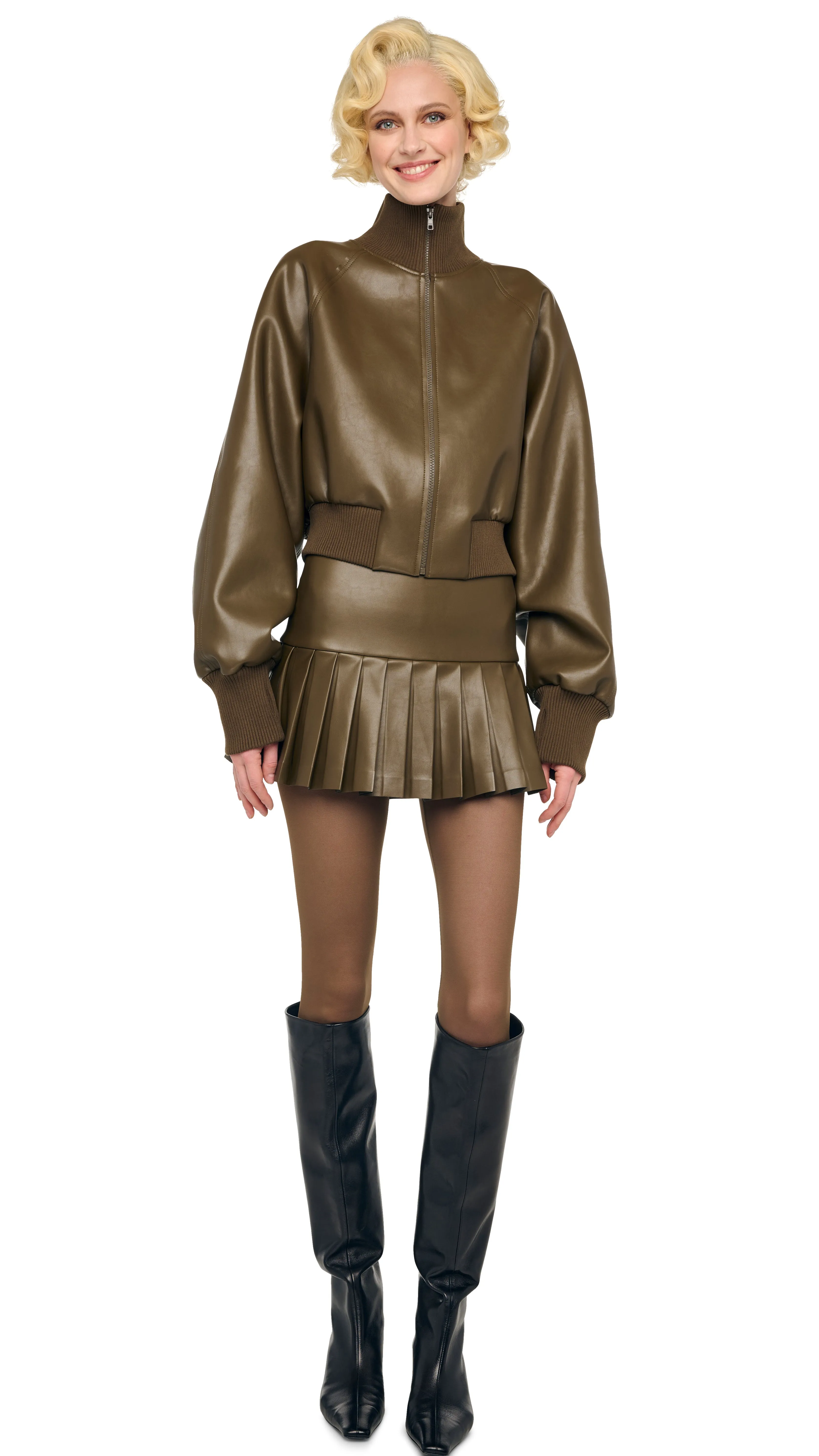 PLEATED PICKLEBALL SKIRT sold by Norma Kamali