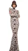 LONG SLEEVE TURTLE FISHTAIL GOWN sold by Norma Kamali