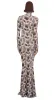 LONG SLEEVE TURTLE FISHTAIL GOWN sold by Norma Kamali