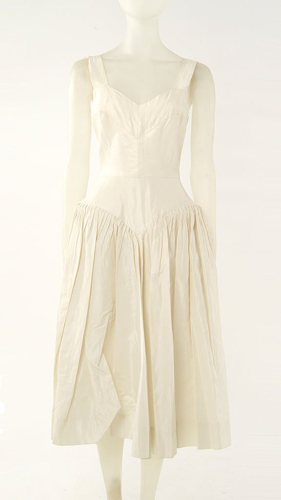 BOW BACK FLARED DRESS sold by Norma Kamali