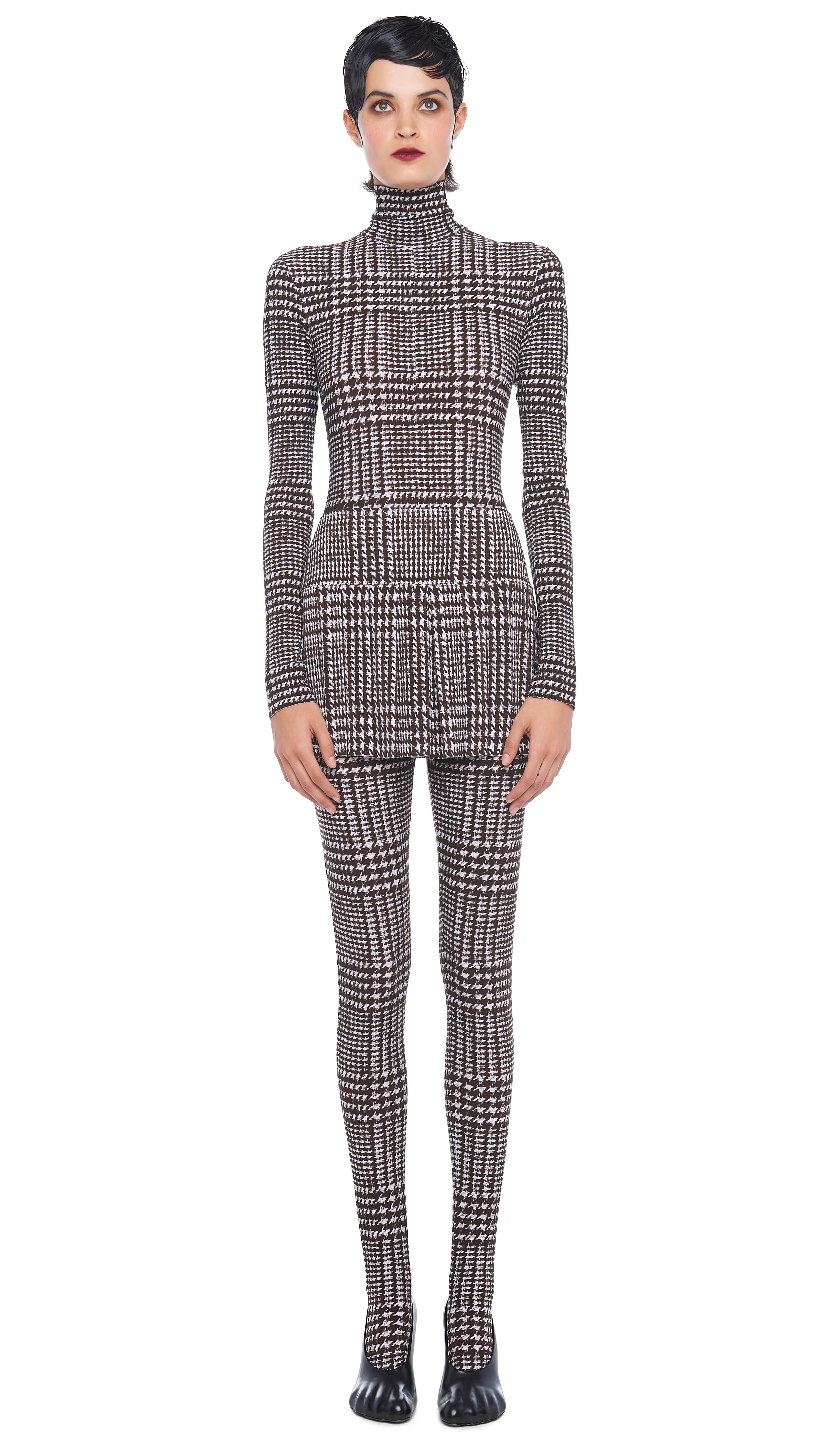 OPEN BACK CATSUIT W/ FOOTSIE sold by Norma Kamali