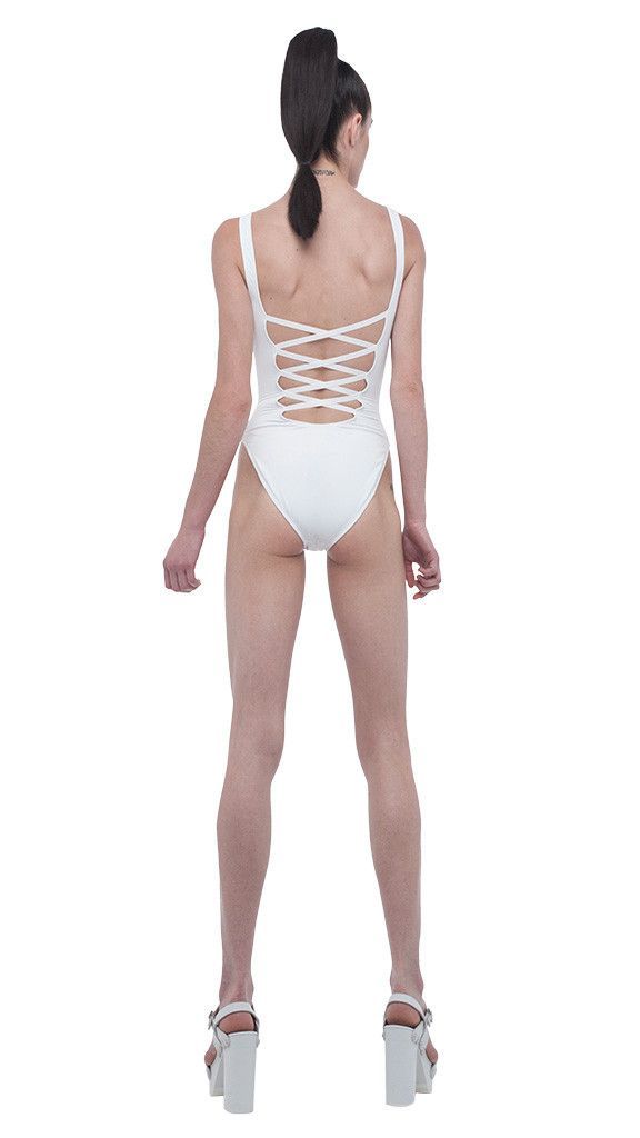 SUPER LOW BACK LACE BACK sold by Norma Kamali