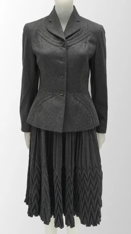 OVERLAY DETAIL JACKET W/ COMBO ACCORDION PLEAT SKIRT sold by Norma Kamali