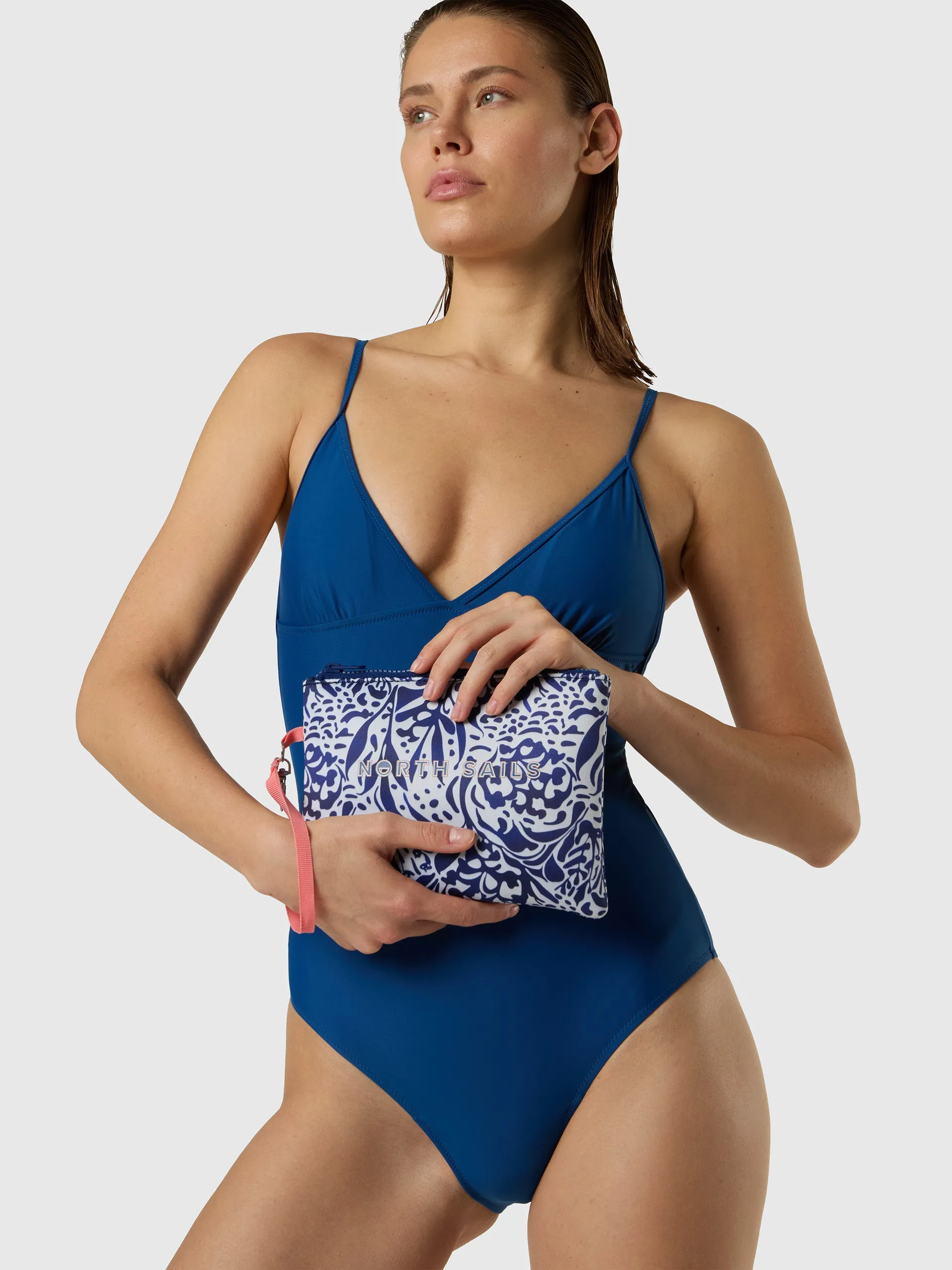 Neoprene pouch with coral print sold by North Sails