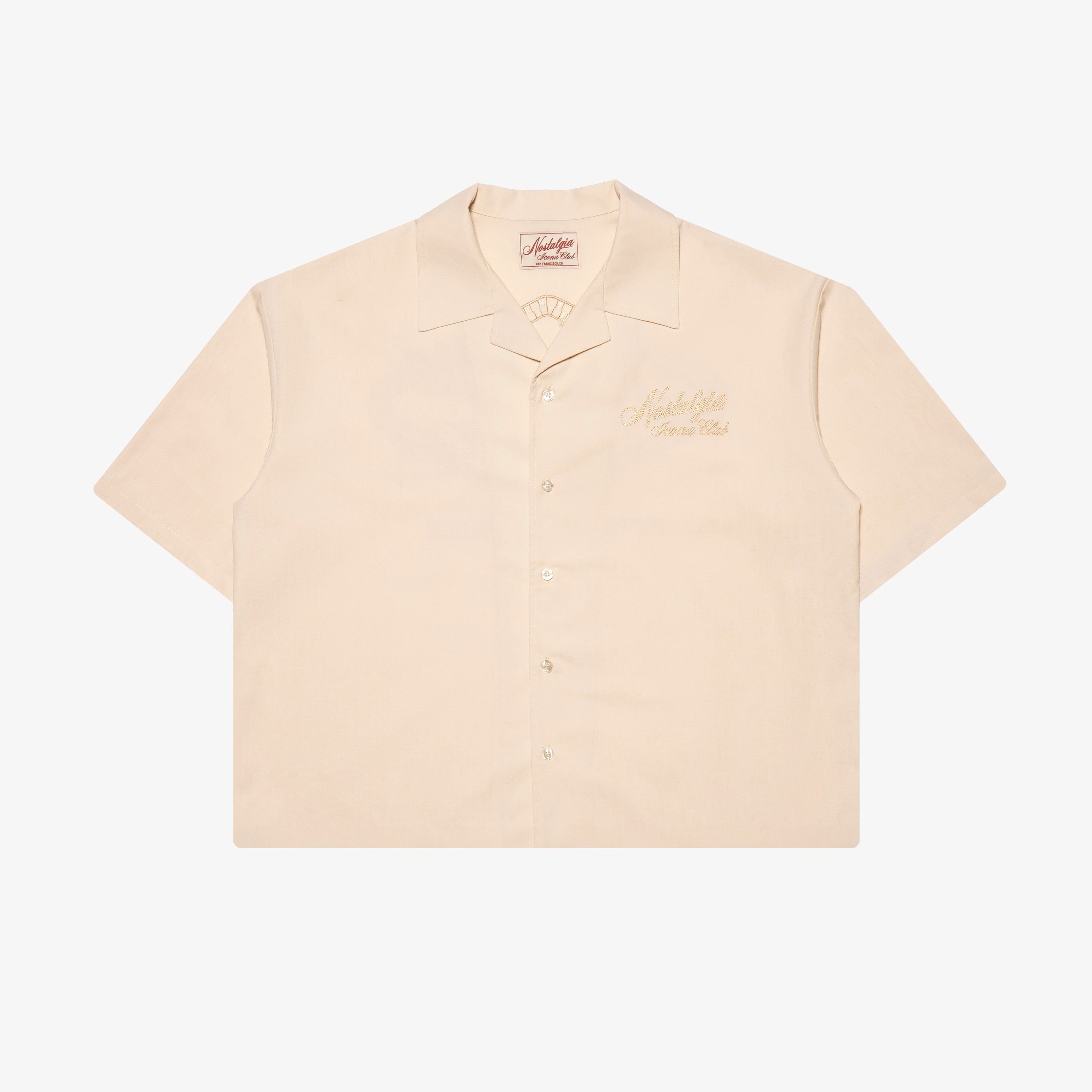 CREAM AUTO PERFORMANCE BUTTON-UP sold by Nostalgia