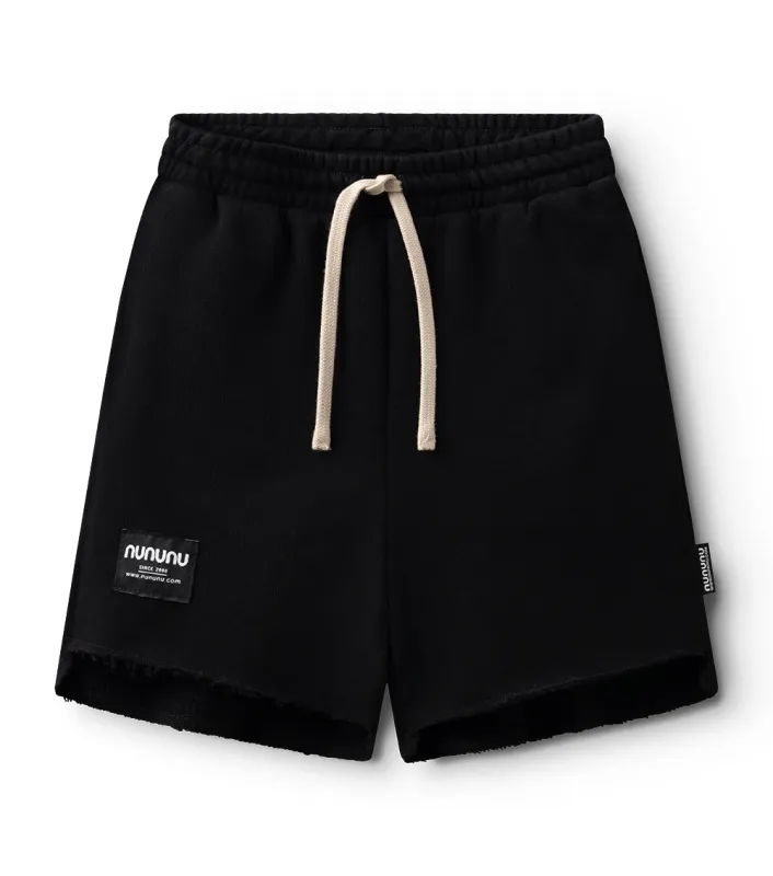 unbalanced shorts sold by nununu