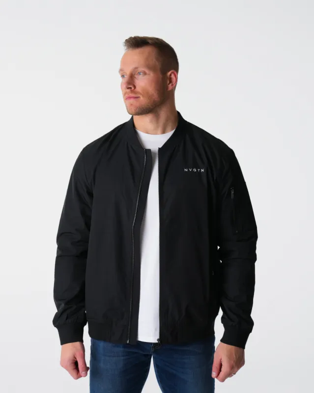 Black Bomber Jacket sold by NVGTN