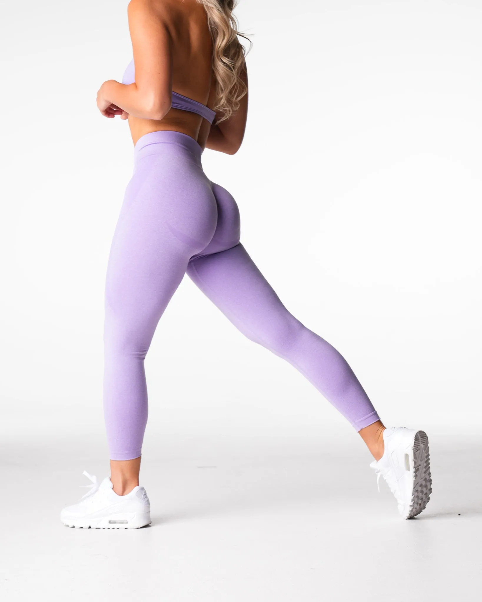 Lilac Mid Rise Contour Seamless Leggings sold by NVGTN