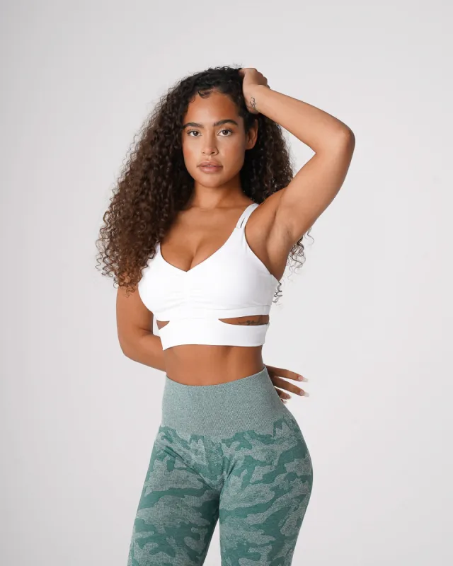 White Revolve Bra sold by NVGTN
