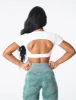 White Open Back Tee sold by NVGTN