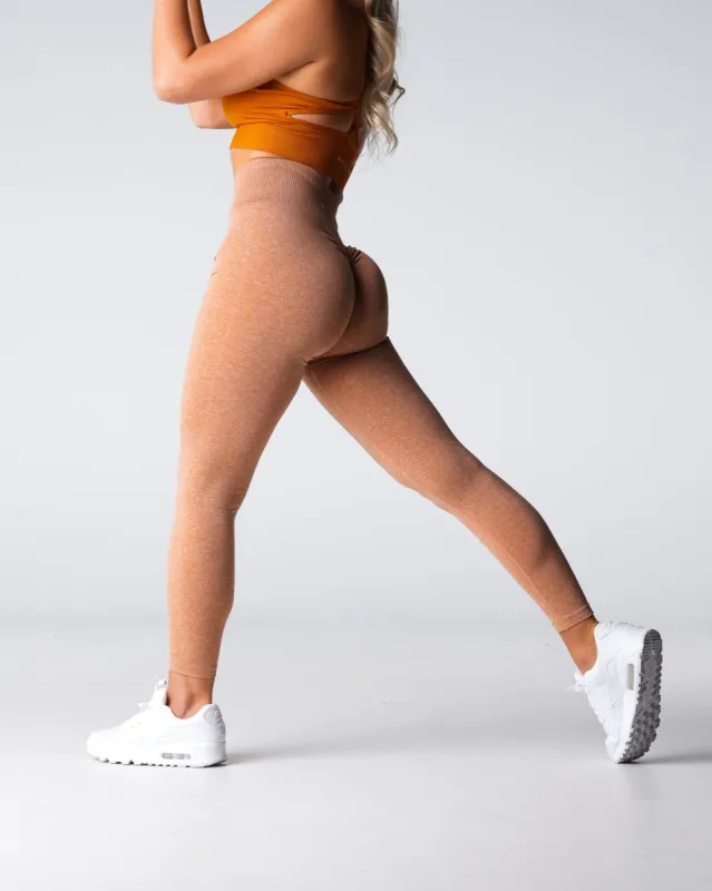 Terracotta Scrunch Seamless Leggings sold by NVGTN