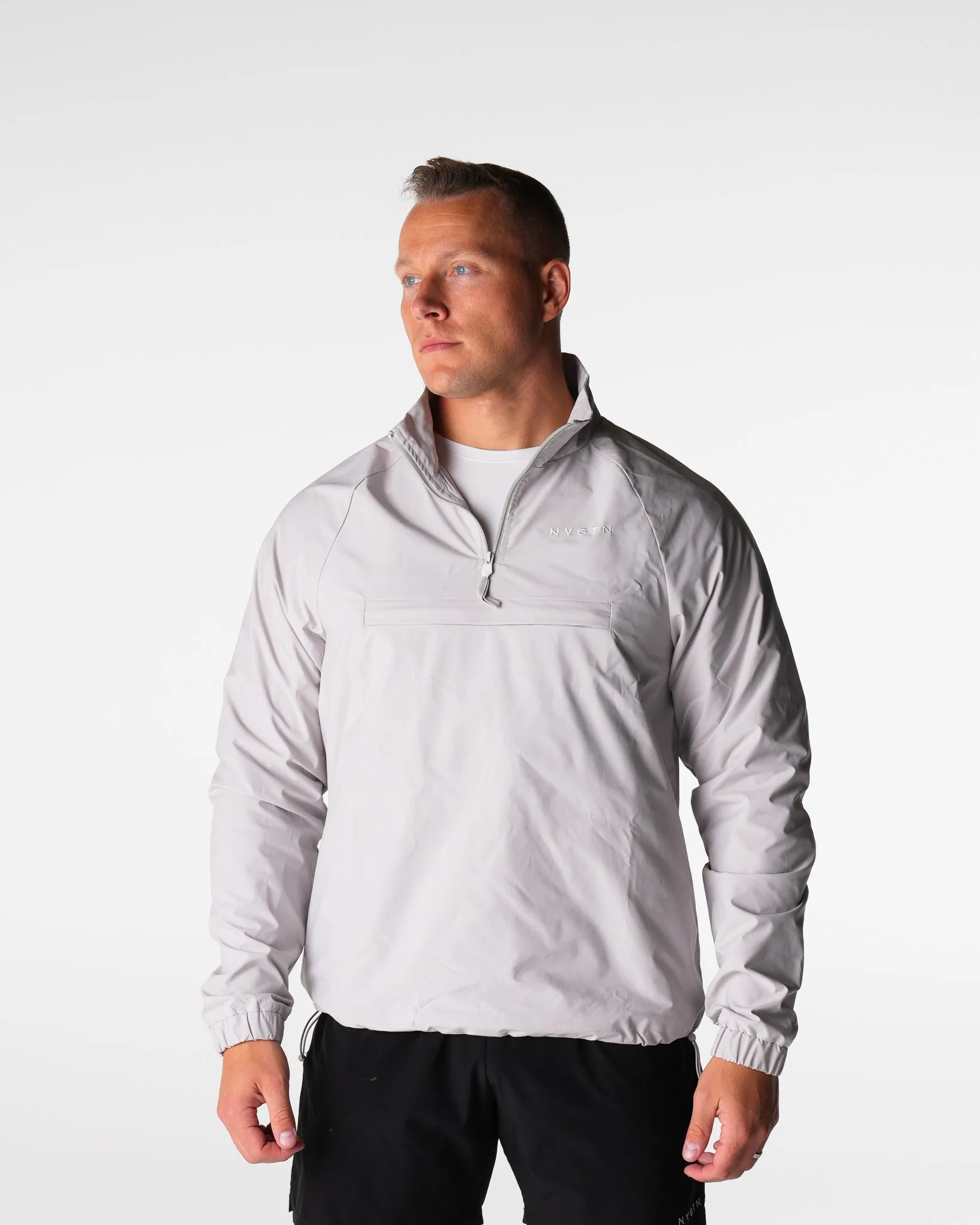 Grey Motion Windbreaker sold by NVGTN