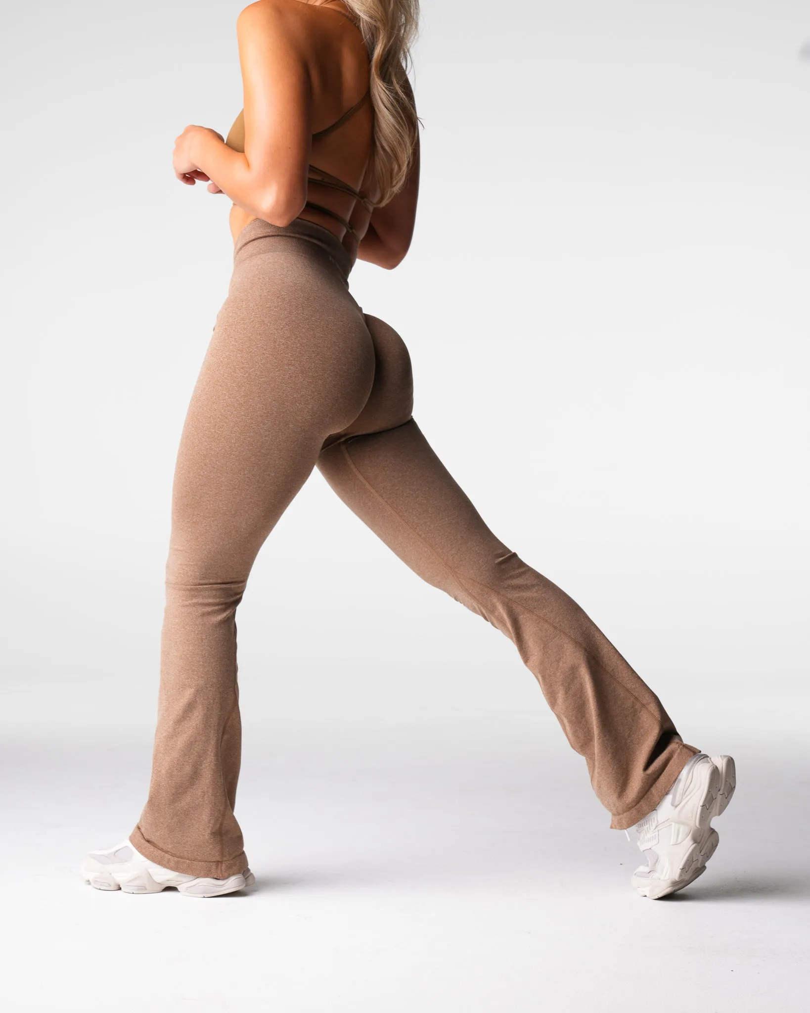 Mocha Iconic Seamless Flare Leggings sold by NVGTN