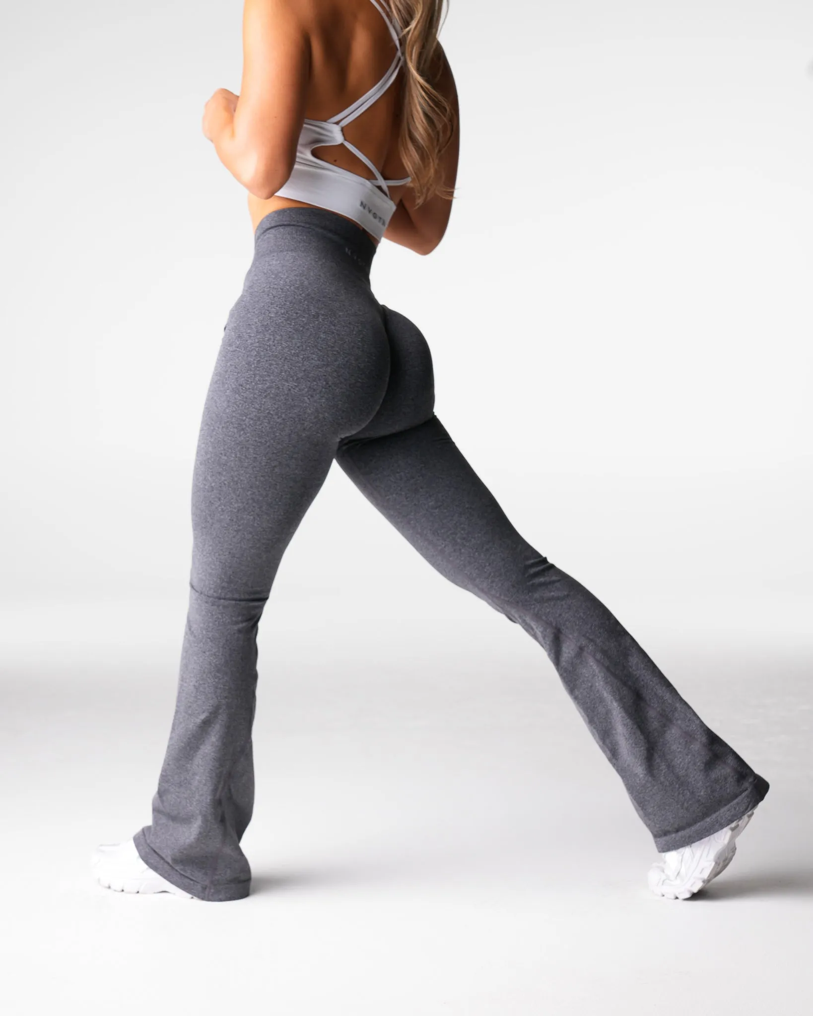 Black Speckled Iconic Seamless Flare Leggings sold by NVGTN