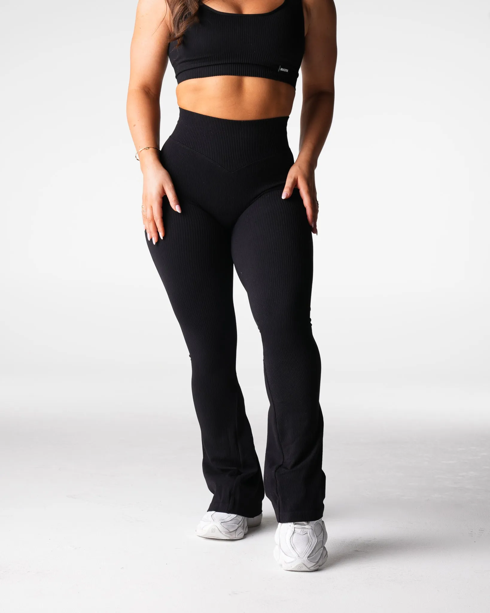 Black Harmony Ribbed Seamless Flare Leggings sold by NVGTN product image thumbnail 3
