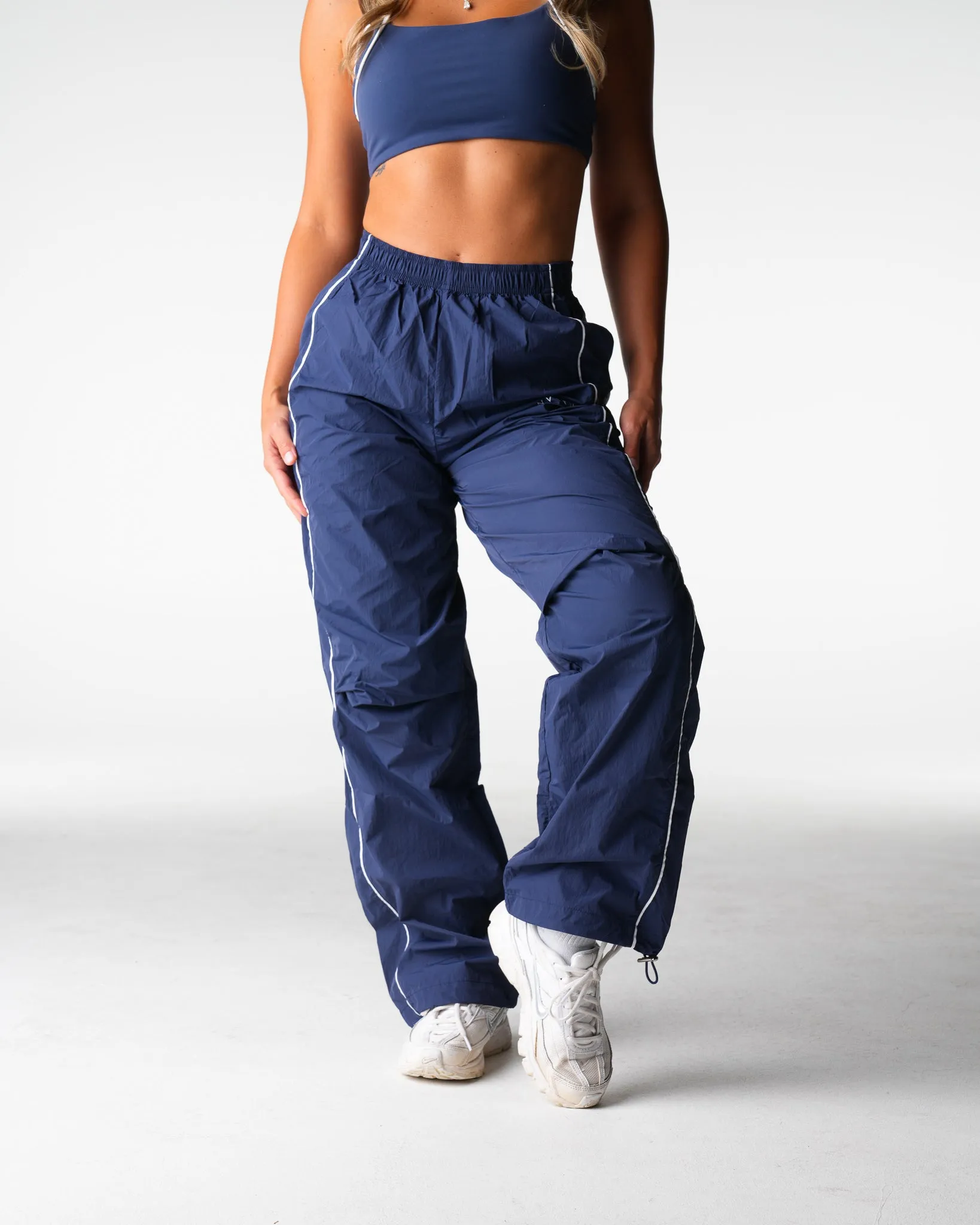 Sonic Stride Windbreaker Pants sold by NVGTN