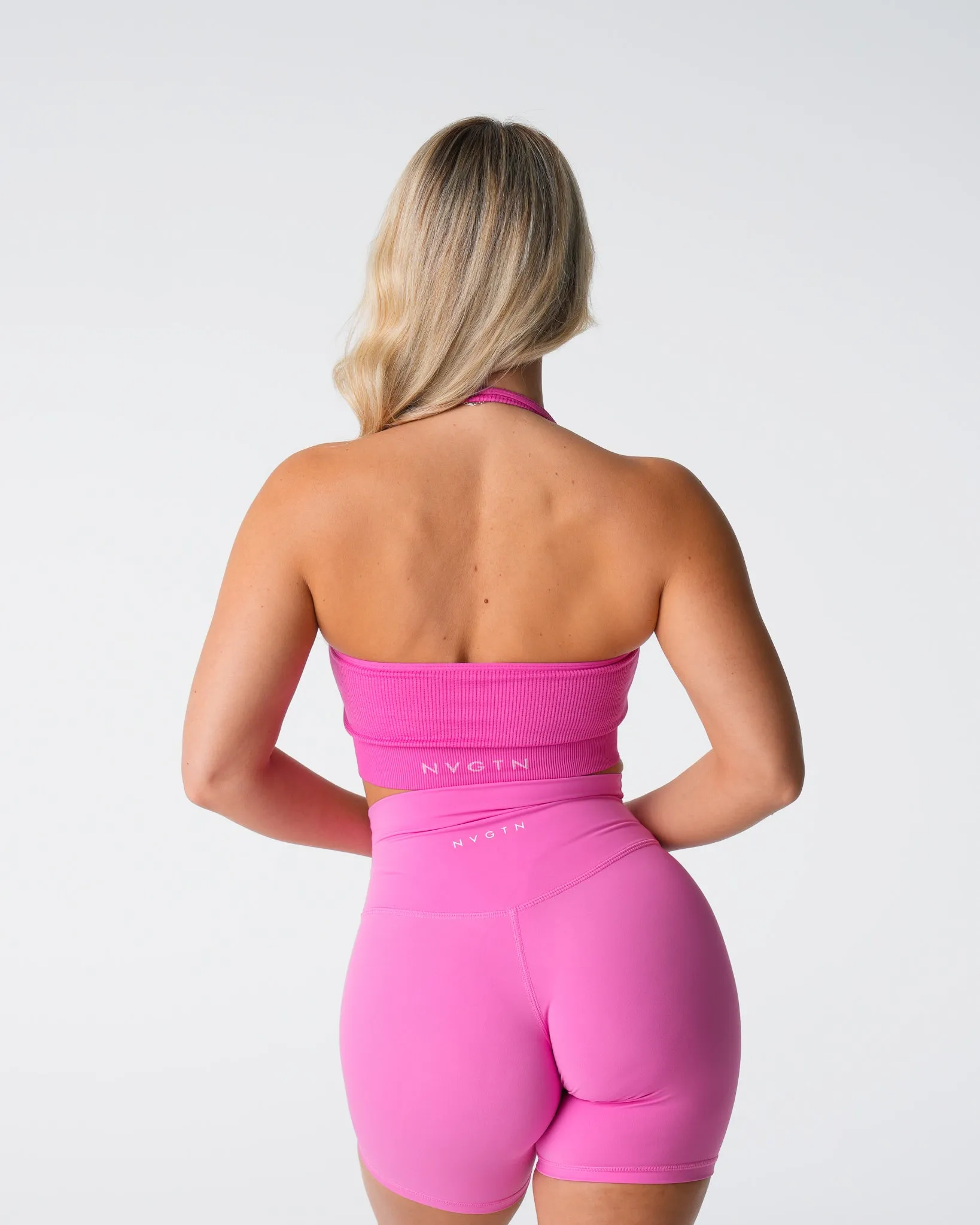 Bubble Gum Pink Limitless Ribbed Seamless Halter Bra sold by NVGTN