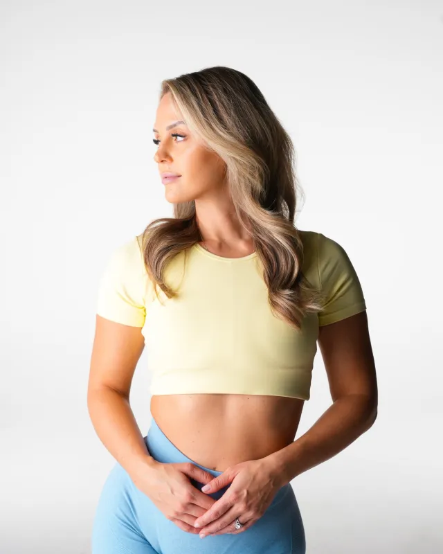 Butter Yellow Solace Open Back Tee made by NVGTN