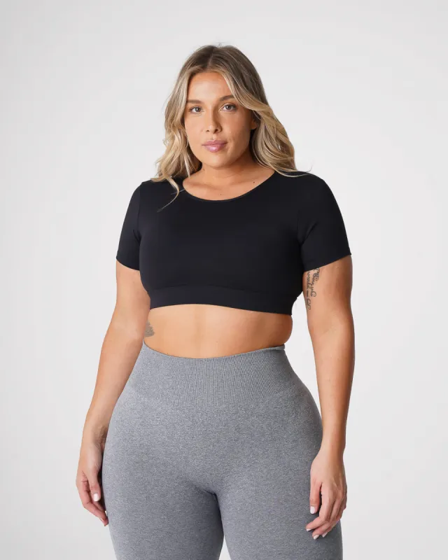 Black Open Back Tee sold by NVGTN