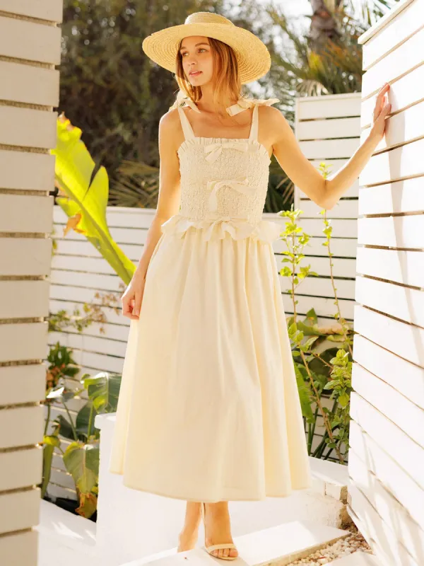 SMOCKED MIDI DRESS WITH BOW DETAIL sold by OAK