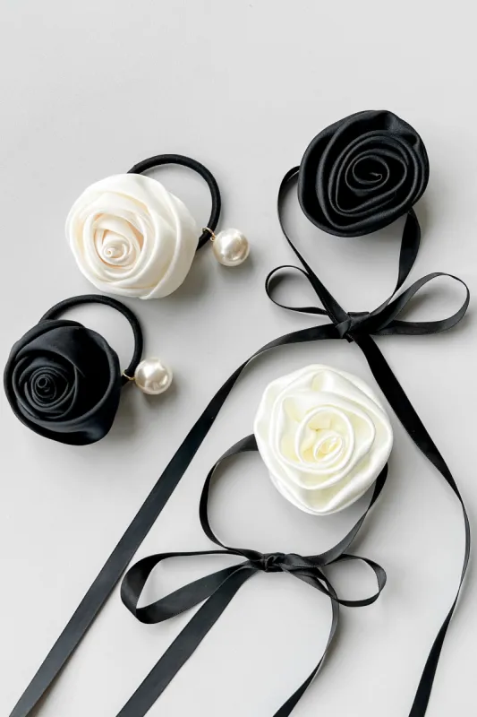 HAIR TIE WITH OVERSIZED FLOWER AND PEARL sold by OAK AND FORT