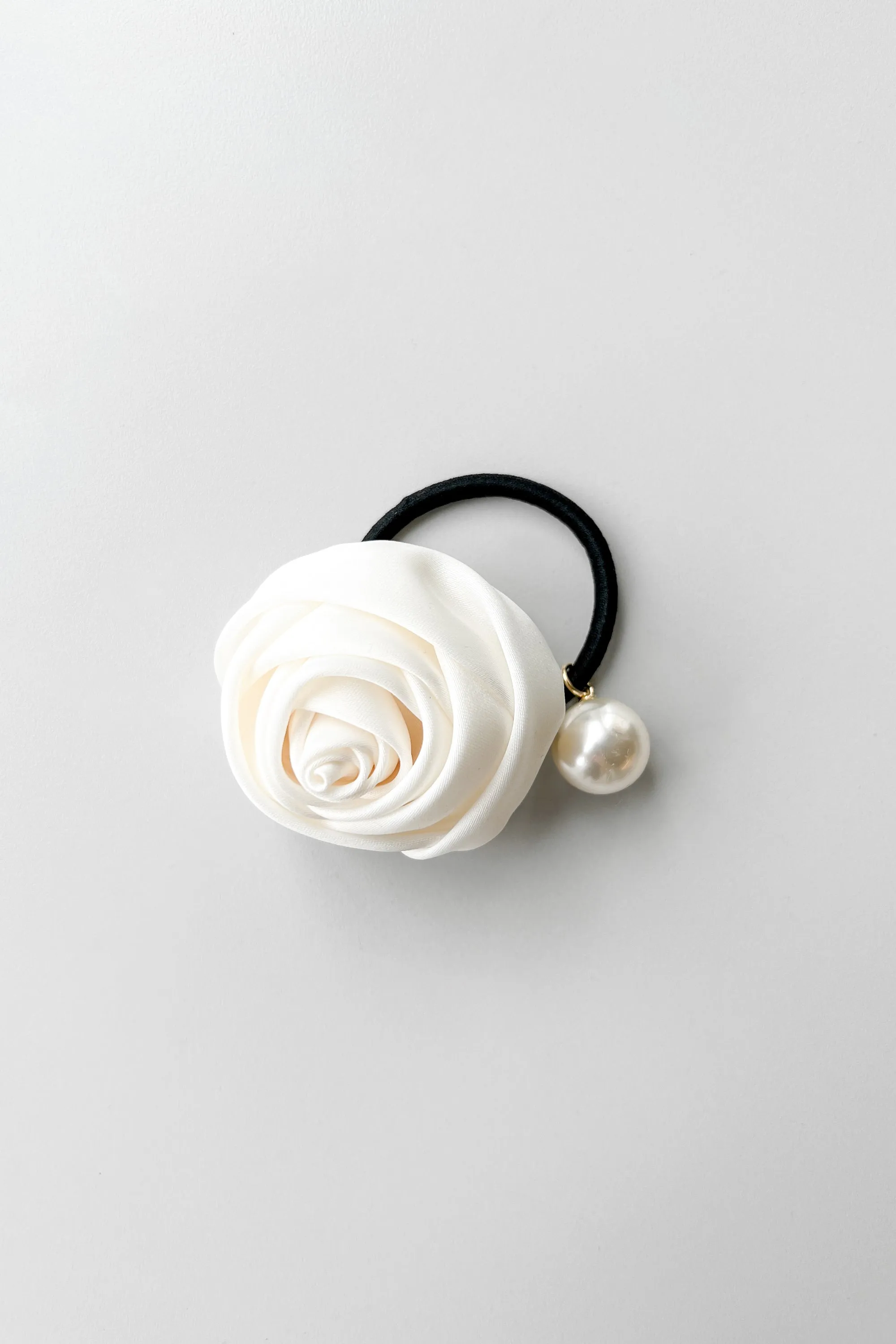 HAIR TIE WITH OVERSIZED FLOWER AND PEARL sold by OAK AND FORT product image thumbnail 3