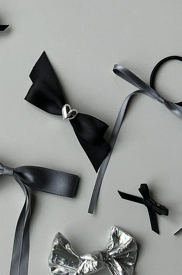 BOW HAIR CLIP WITH BUBBLE HEART PENDANT sold by OAK AND FORT