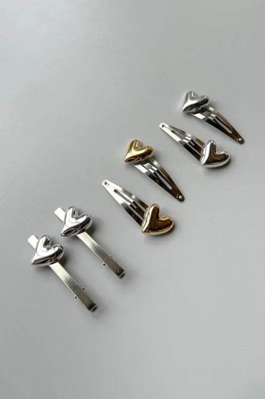 SET OF METALLIC HAIR CLIPS WITH HEART PENDANT sold by OAK AND FORT