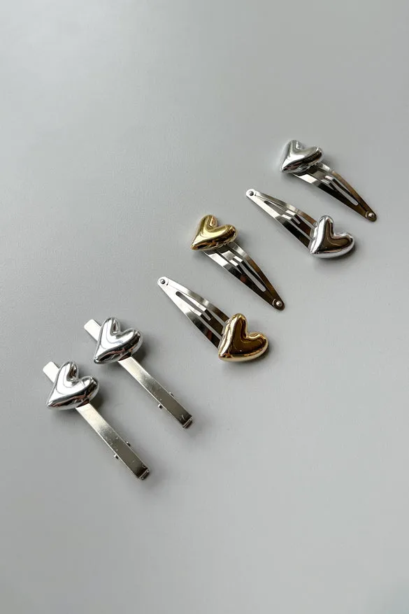 SET OF METALLIC HAIR CLIPS WITH HEART PENDANT sold by OAK AND FORT