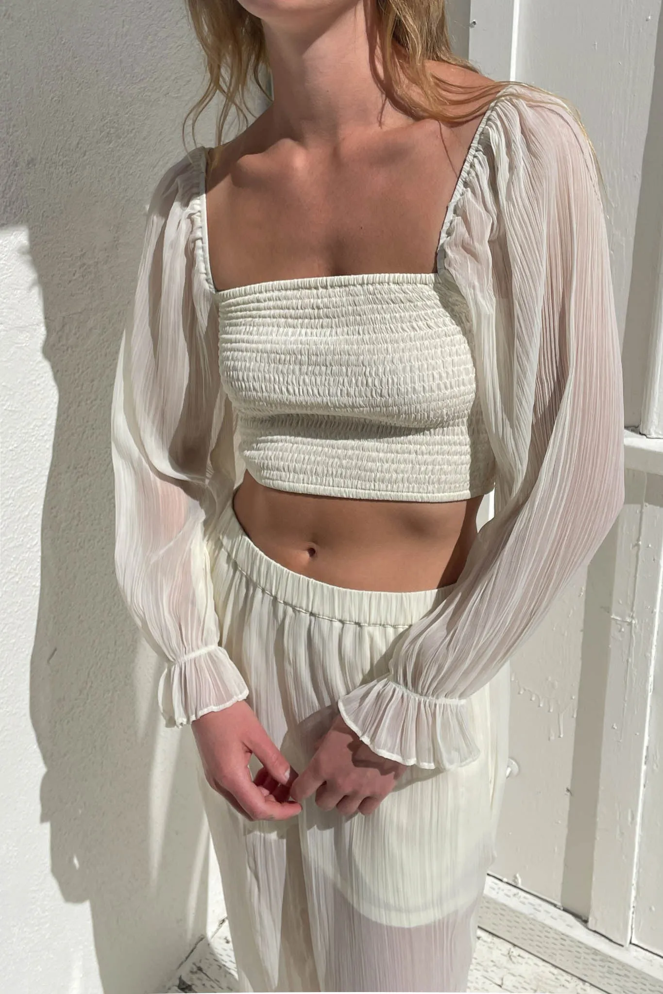 SMOCKED RUFFLE SLEEVE BLOUSE sold by OAK AND FORT