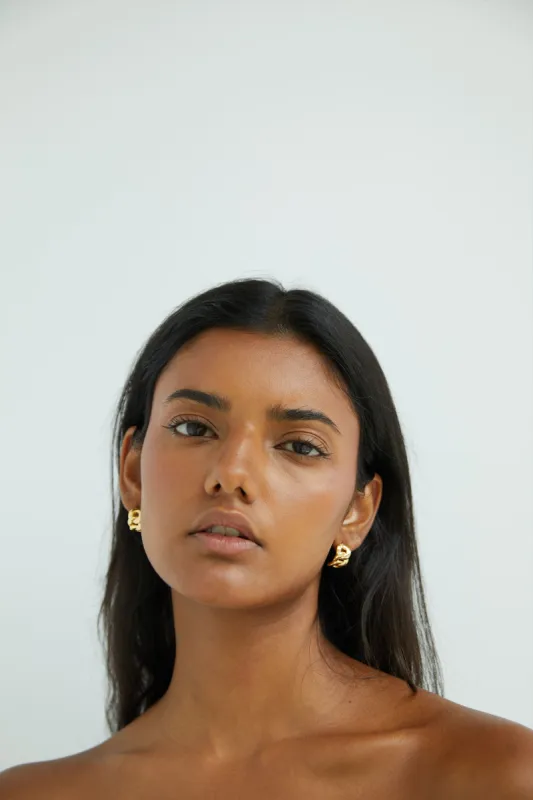 BRAIDED HALF HOOP EARRING sold by OAK AND FORT