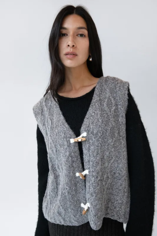 CABLE KNIT VEST WITH TOGGLES sold by OAK AND FORT